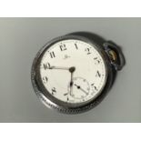 A white metal open-faced Omega pocket watch, the white enamel dial with Arabic numerals denoting