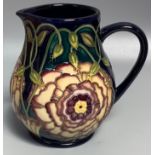 A Moorcroft Pottery 'Eustoma' jug, designed by Carole Lovatt for the Connoisseur Collection, dated