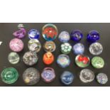 A collection of glass paperweights including anniversary of Battle of Britain, Caithness, Barranta