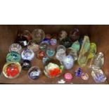 A collection of glass paperweights, Caithness and various other makes