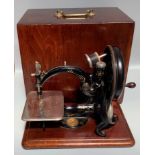 A 19th century US C frame sewing machine by Willcox & Gibbs Sewing Machine Co New York London Paris,