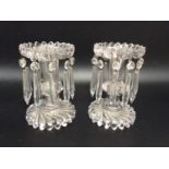 A pair of 19th century clear cut glass lustre vase/candlesticks, with spiral pans and bases, and