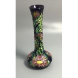 A Moorcroft limited edition pottery vase of Persian form, No.17, decorated in the 'Aster' pattern
