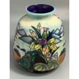 A Moorcroft Design Studio pottery vase of oviform shape with inverted rim, decorated in the '