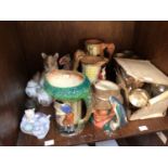 A collection of assorted ceramics including three Burleigh Ware relief moulded jugs, two NAO