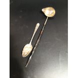 An Irish silver berry spoon, Dublin, 1791, maker's mark of John Pittar, together with a Georgian