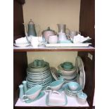 SECTIONS 1 & 2. A Susie Cooper coffee pot, six cups and saucers and a cream jug, in green and