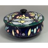 A Moorcroft pottery bowl and cover decorated in the 'Favrile' pattern (dragonflies) after Nicola