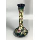 A Moorcroft Design Studio pottery vase of Persian form, decorated in the 'Fiji' pattern after Emma