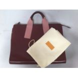 A large Radley briefcase / laptop and document holder with compartmented interior, in cherry and