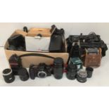 A large quantity of camera equipment including a Canon EOS 10 camera, Canon video recorder in
