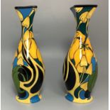A pair of Black Ryden pottery vases of baluster form with 'squared flared' rims, designed by Emma