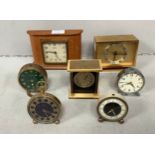 Seven assorted clocks including examples by Suiza, Oris and Bolux etc.