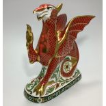 A commemorative Royal Crown Derby paperweight, 'Welsh Dragon', to celebrate the marriage of HRH