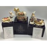 Three Royal Crown Derby paperweights, 'Holly', limited edition number 1237/1500, 'Thistle',