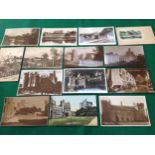 A box containing a substantial collection of nearly 700 standard-sized postcards of British