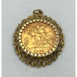 A 22ct gold 1910 half sovereign in a bark effect mount, total weight 6.7 grams.