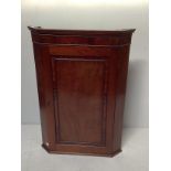 Two various large Georgian mahogany hanging corner cupboards with flame veneer top panel, 120 &