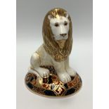 A Royal Crown Derby paperweight, 'Heraldic Lion', with printed marks to base and gold stopper,