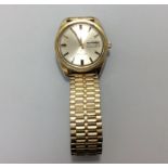 A gents gold-plated Omega Seamaster automatic wristwatch, the silvered dial with batons denoting