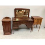 A Spillman and & Co stained walnut inverted break-front dressing table, with blind-fret carved