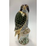 A Royal Crown Derby paperweight, 'Harrods Peregrine Falcon', with printed marks to base and gold