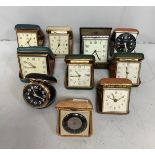 Ten assorted travel alarm clocks comprising a Smiths Seafarer, a Seiko repeat and an Oris example