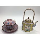 A Chinese Ch'ien Lung style enamel-on-copper teapot, of lotus shape with loop handle, delicately