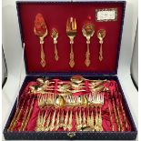 A gilt cutlery set in fitted box of 37 pieces