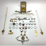 A mixed lot of costume jewellery including a white metal (tests as 18ct gold) ring, set with 7 small
