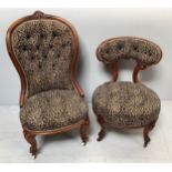 A Victorian stained walnut spoon-back nursing chair on cabriole supports to castors, and an early