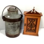 A galvanised metal 25 litre milk churn, together with a mahogany arts and crafts table-top cabinet
