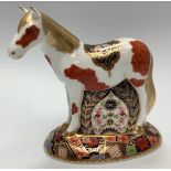 A Royal Crown Derby paperweight, 'Falabella', with printed marks to base and gold stopper, limited