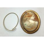 A yellow gold shell carved cameo brooch, tests as better than 14ct, carved with a female with