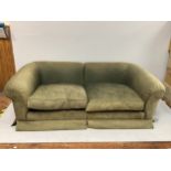 A pair of large and deep sofas, for reupholstery, originally from Harrods, with low backs,