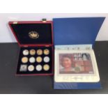 A small collection of assorted silver and gold-plated coins, together with 11 QEII commemorative