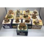 Thirty two various Lilliput Lane models over 3 shelves including 'Cosy Corner', 'Make a Wish', '