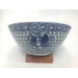 A Chinese blue & white porcelain medicine/poison bowl painted to the inside with a seated