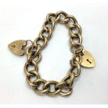 A 9ct yellow gold double padlock large link bracelet, weighing 31.4 grams.