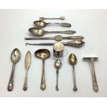 A small collection of assorted silver and silver-plated flatware comprising a silver christening