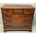 An 18th century mahogany chest of drawers with three short over three long drawers with cock