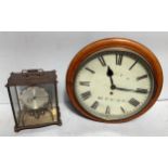 A 19th century wooden cased circular wall clock with fusee movement, cream enamel dial, black