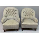 A pair of Howard & Sons 'style' large tub armchairs with deep button blue-striped upholstery, on