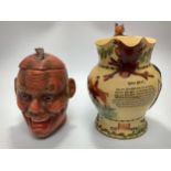 A Japanese papier-mache tobacco jar/ cigar box modelled as a laughing head, together with a Crown