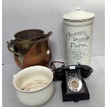 A black bakelite vintage telephone and a stoneware pottery Cheavin's 'Saludor' Safe Water Filter,