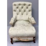 A late Victorian metamorphic upholstered armchair, with pivoting arms and retracting footrest, cream