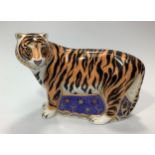 A Royal Crown Derby paperweight, 'Siberian Tiger', with printed marks to base and gold stopper,