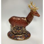 A Royal Crown Derby paperweight, 'The Heraldic Derbyshire Stag', with hallmarked, silver-gilt