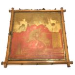 A bamboo and gilt metal wall hanging triptych mirror, the two hinged panels with Chinoiserie