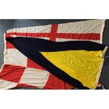 Three various large nautical flags including a size 5 red and white emergency flag